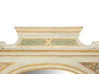 A North Italian Painted and Parcel Gilt Mirror
