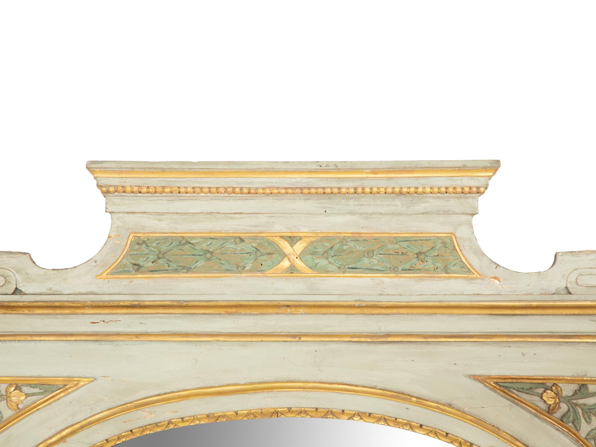 A North Italian Painted and Parcel Gilt Mirror