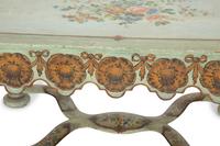 An Italian Painted and Parcel Gilt Low Table