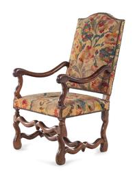 A Louis XIV Walnut Fauteuil à la Reine with Needlework Upholstery