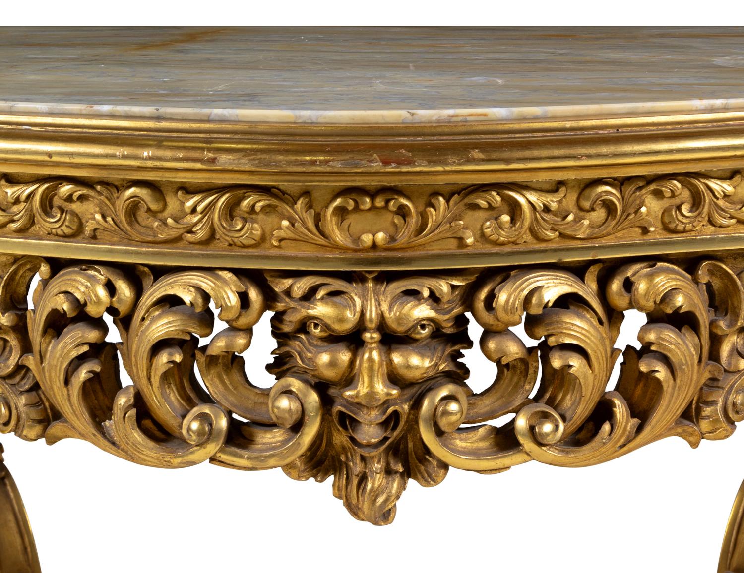 A Neoclassical Carved Giltwood Marble-Top Center Table