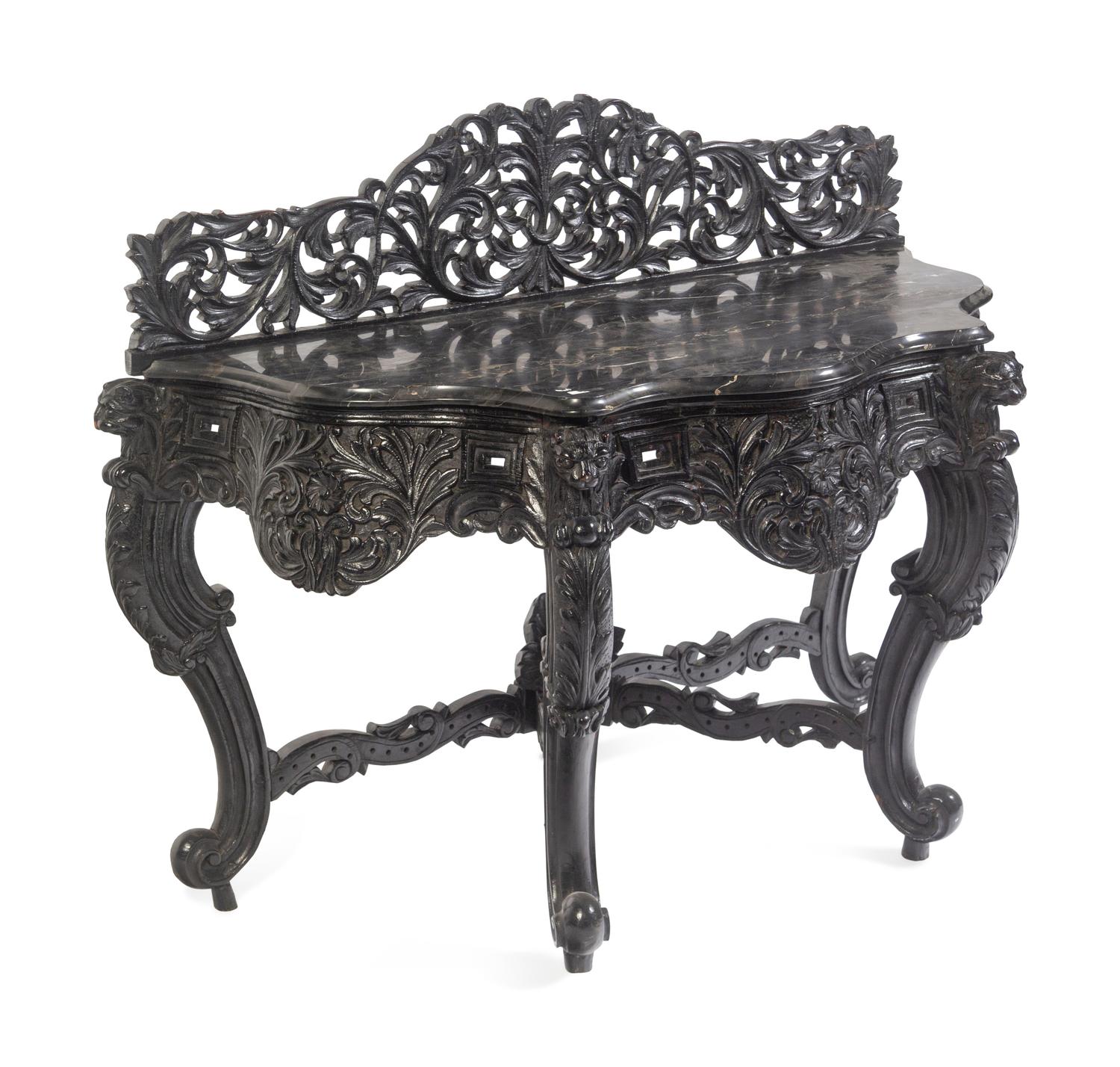 An Anglo-Indian Carved and Ebonized Console Table