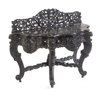 An Anglo-Indian Carved and Ebonized Console Table