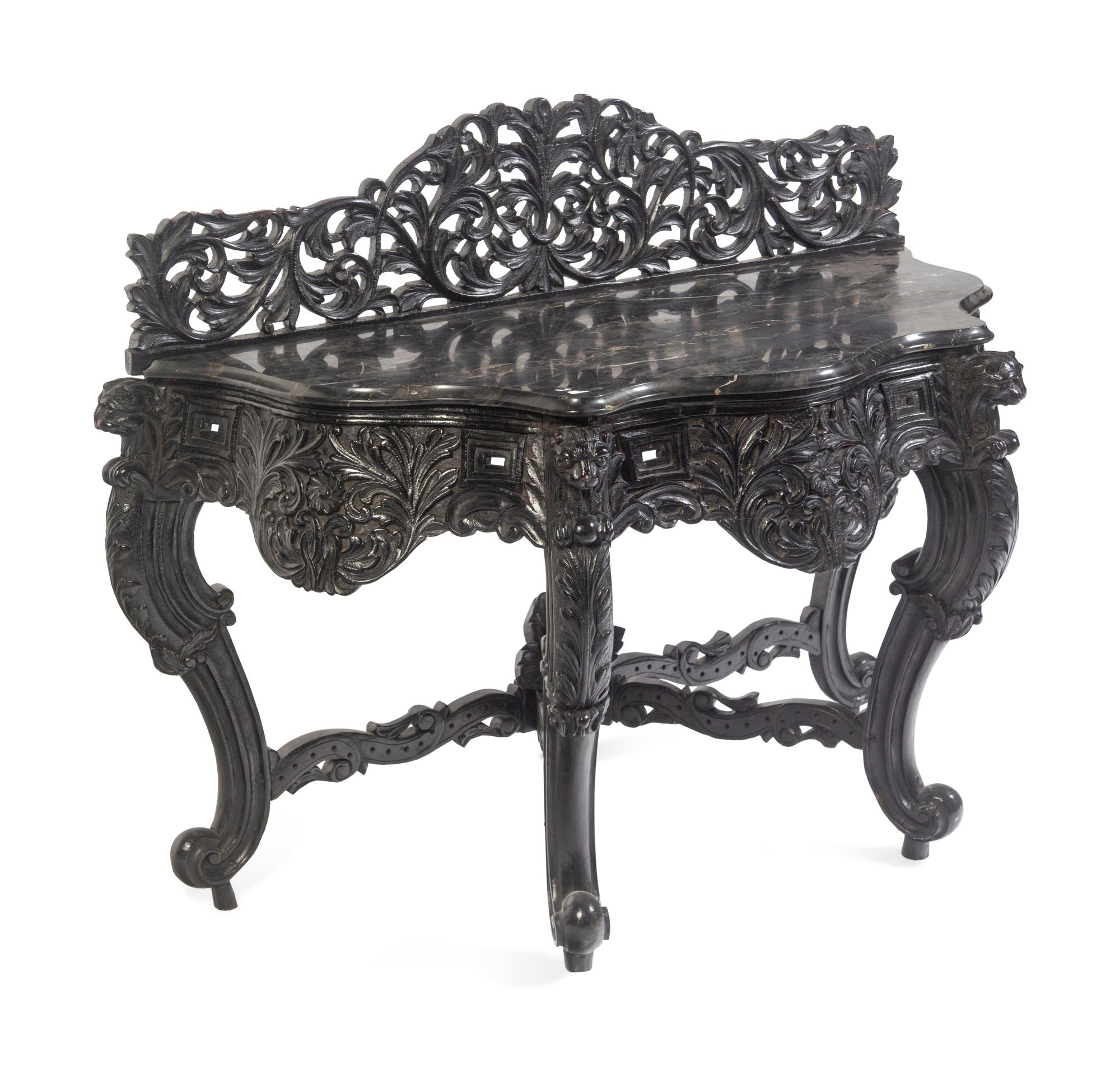 An Anglo-Indian Carved and Ebonized Console Table