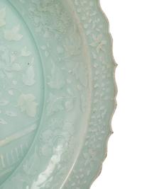 A Chinese Molded Celadon Glazed Porcelain Charger