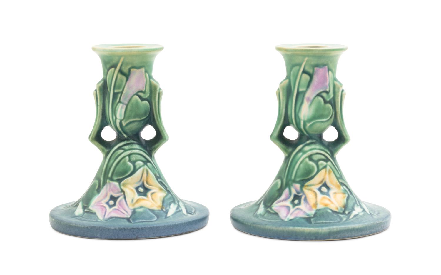 A Pair of Roseville Morning Glory Candlesticks Height 4 3/4 inches.