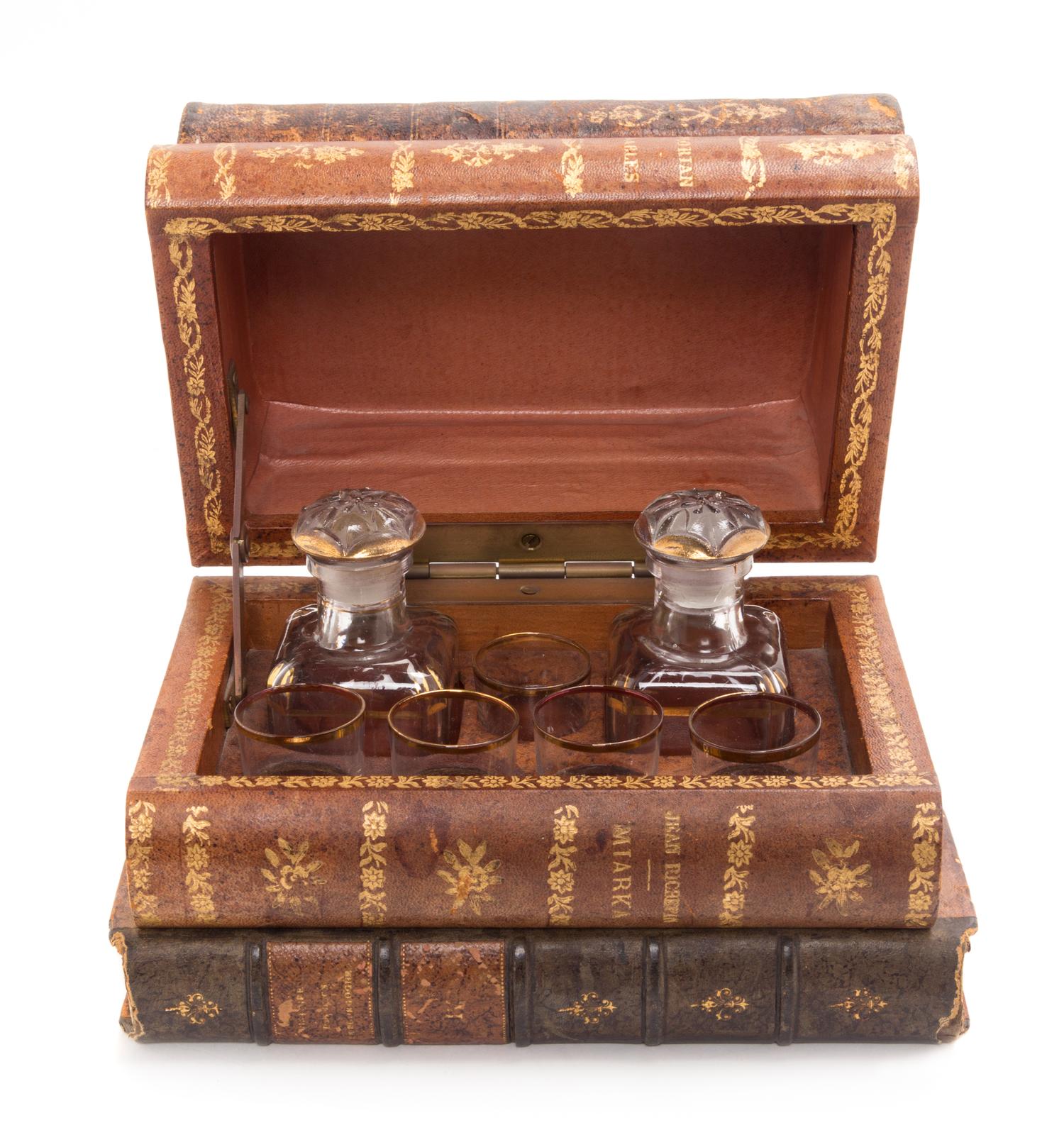 A French Faux Book Form Decanter Set Width 8 1/2 inches.