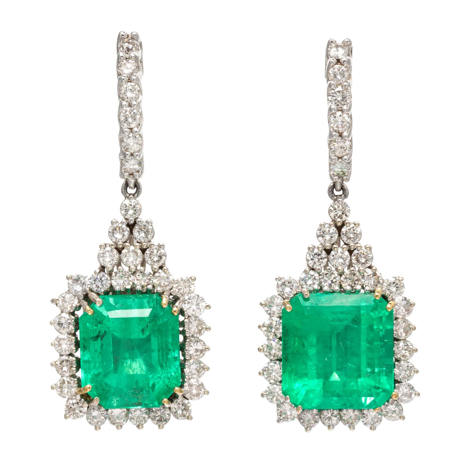 A Pair of 18 Karat Bicolor Gold, Emerald and Diamond Pendant Earclips, 15.60 dwts.
