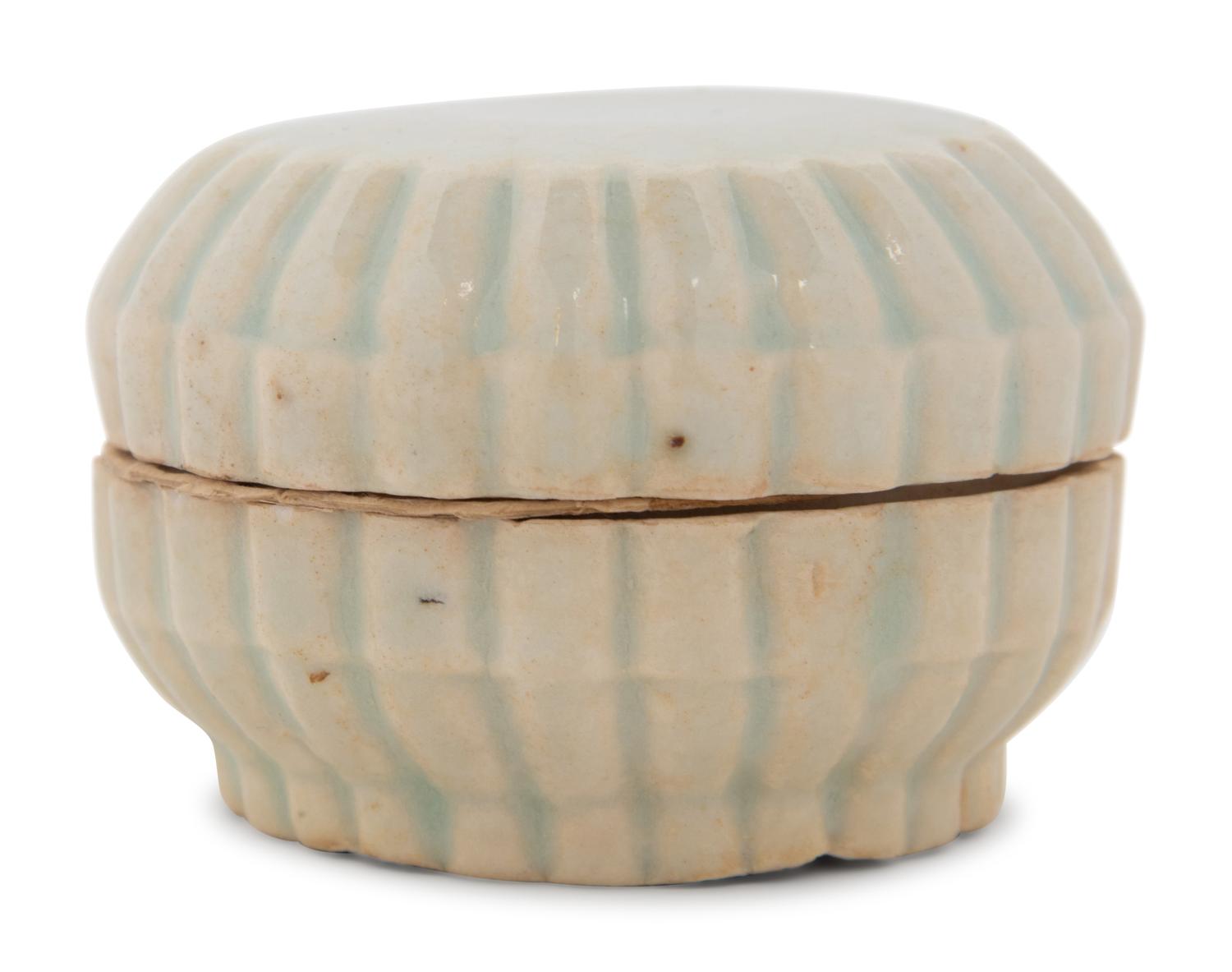 A Qingbai Glazed 'Chrysanthemum' Porcelain Box and Cover