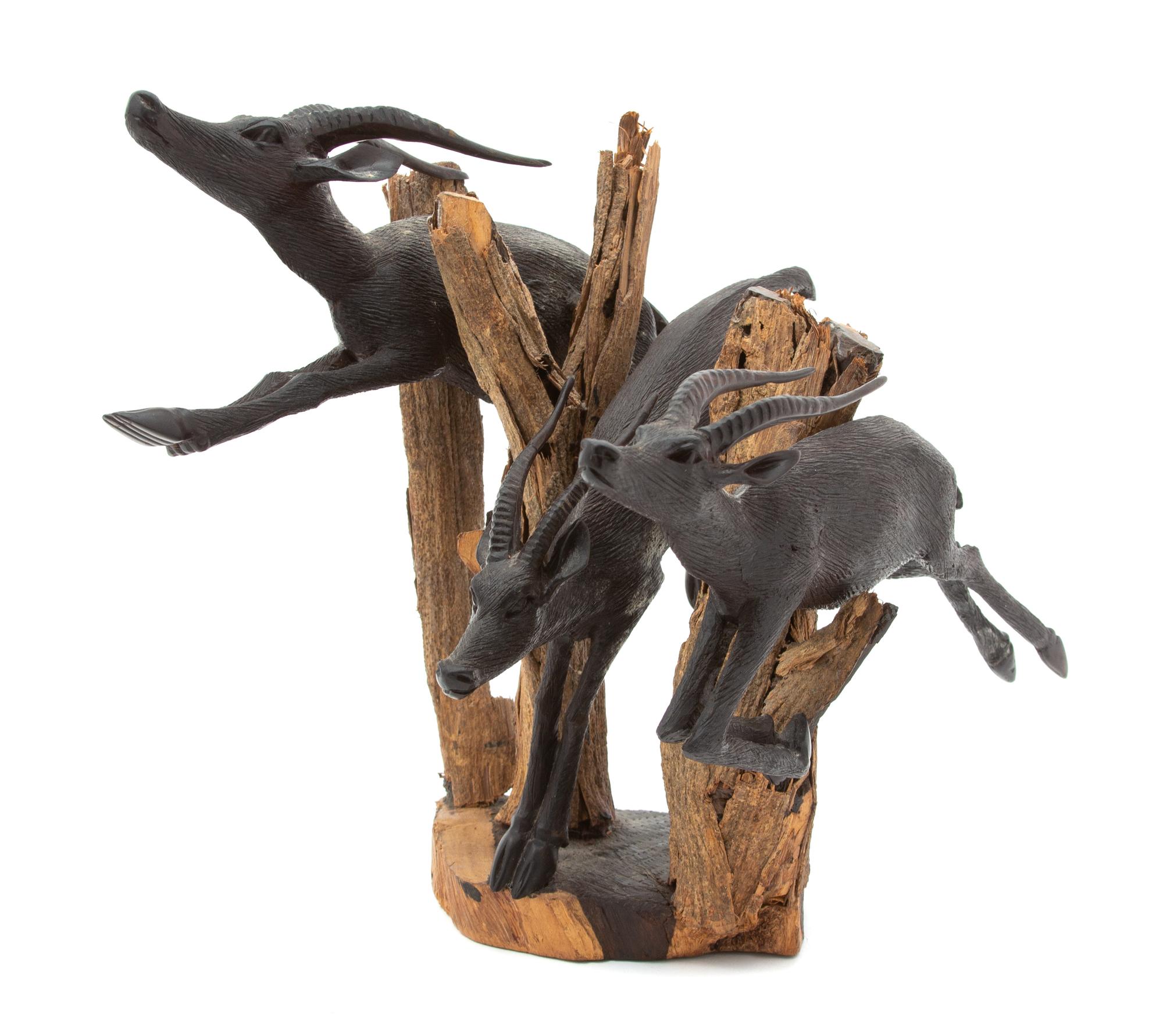 An African Peter Nziale Carved Wood Sculpture of Antelopes Height 9 1/2 inches. — 20TH CENTURY