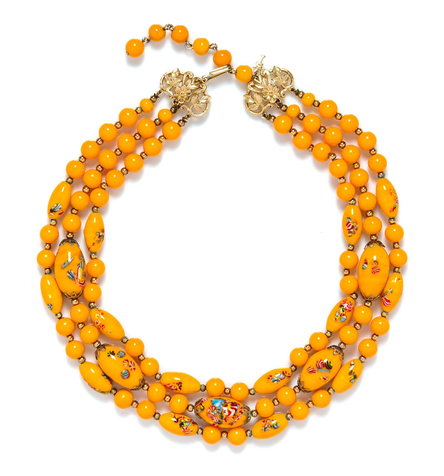 A Trifari Hand Painted Triple Strand Orange Necklace.