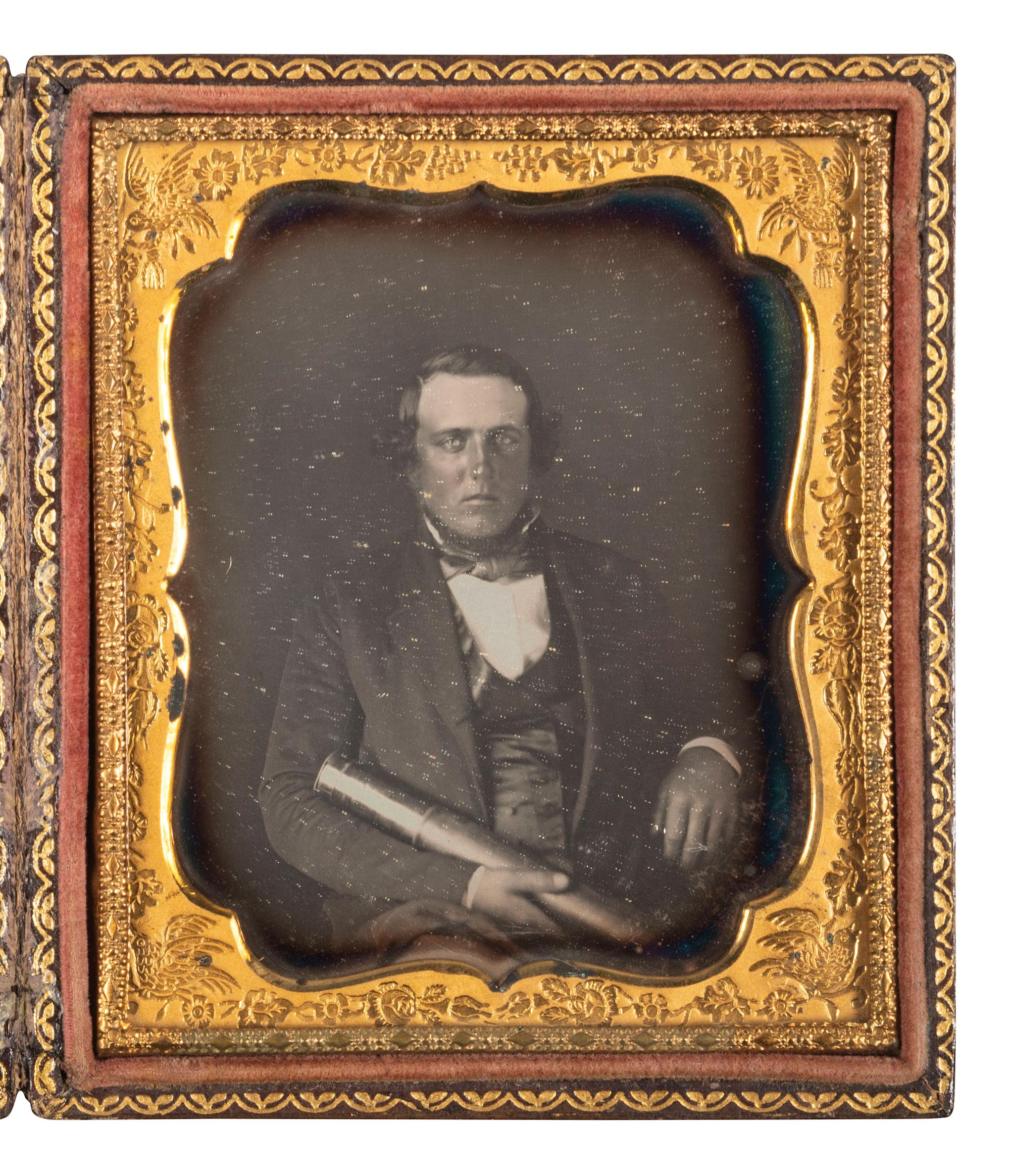 [EARLY PHOTOGRAPHY]. Sixth plate daguerreotype portrait of a man with a telescope, with letter from Eben Seavey of Scarborough, Maine referencing a Captain Elisha Newcomb.
