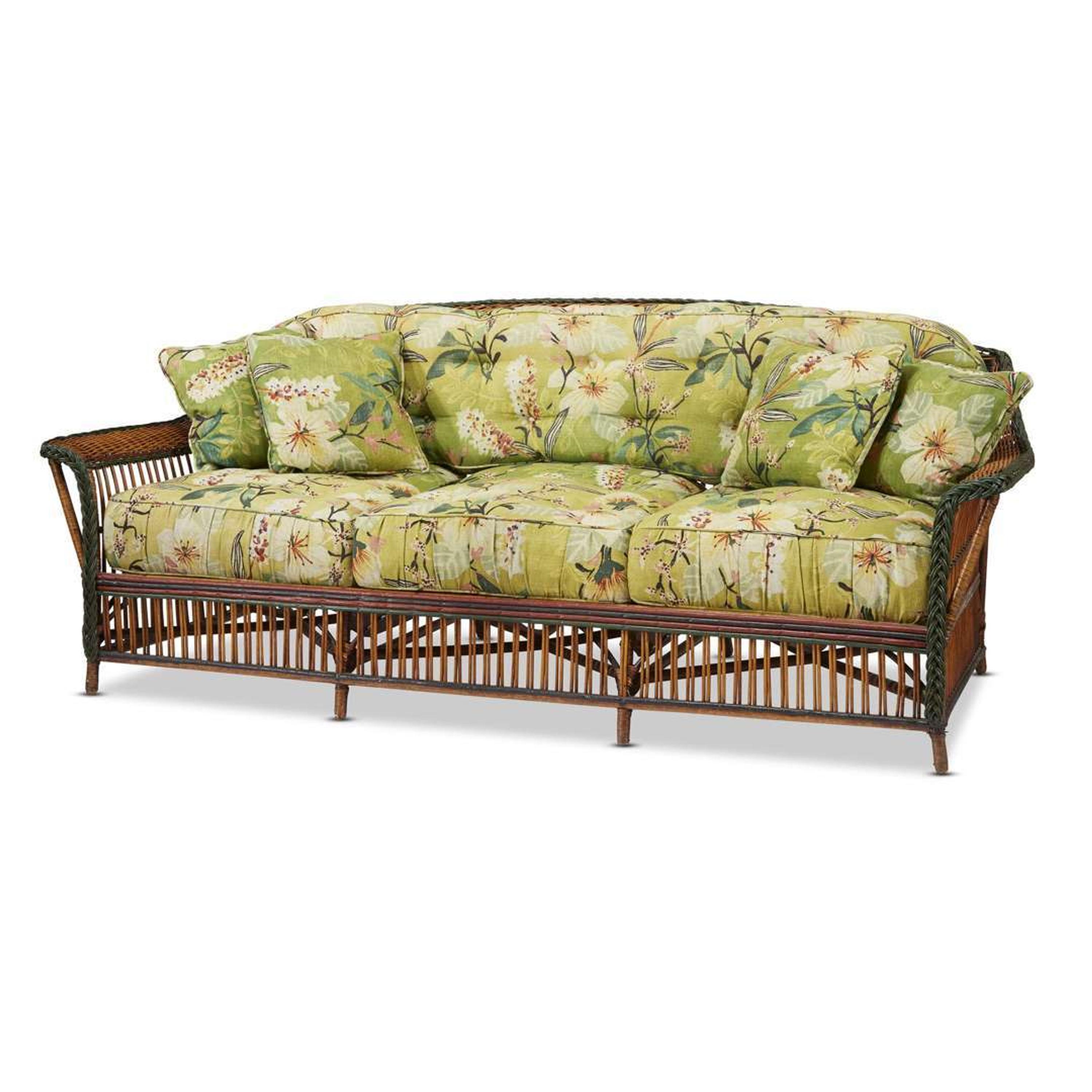 A polychome painted and upholstered rattan sofa american, circa 1920