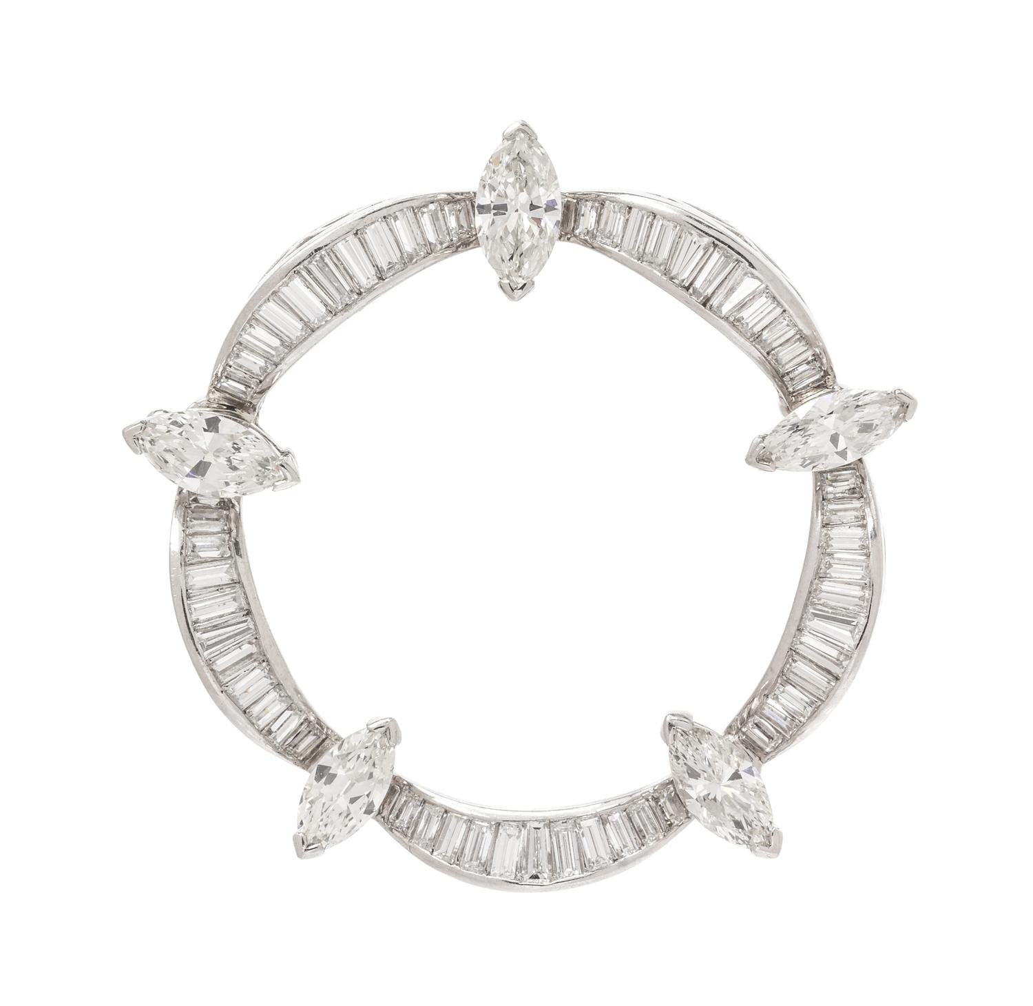 A Platinum and Diamond Circle Brooch, 8.40 dwts.