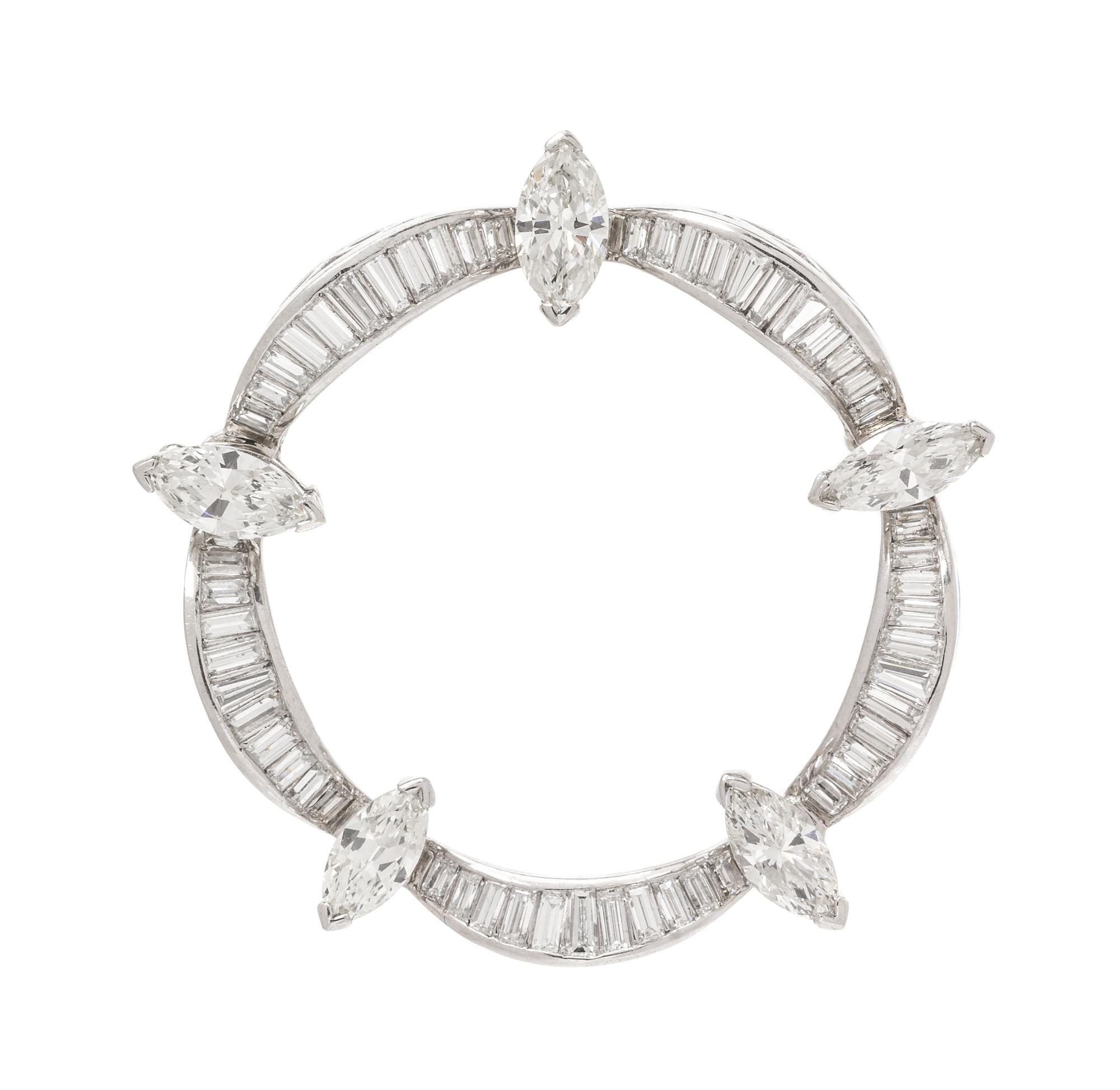 A Platinum and Diamond Circle Brooch, 8.40 dwts.