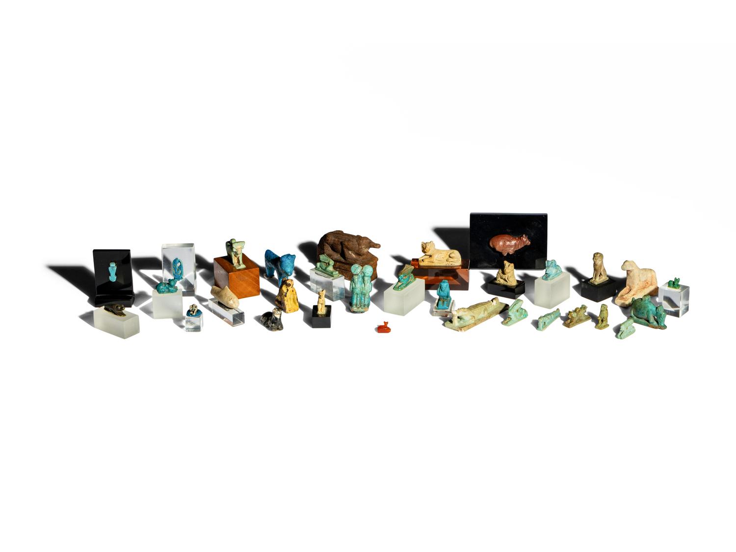 31 Egyptian Faience, Wood, and Stone Animals