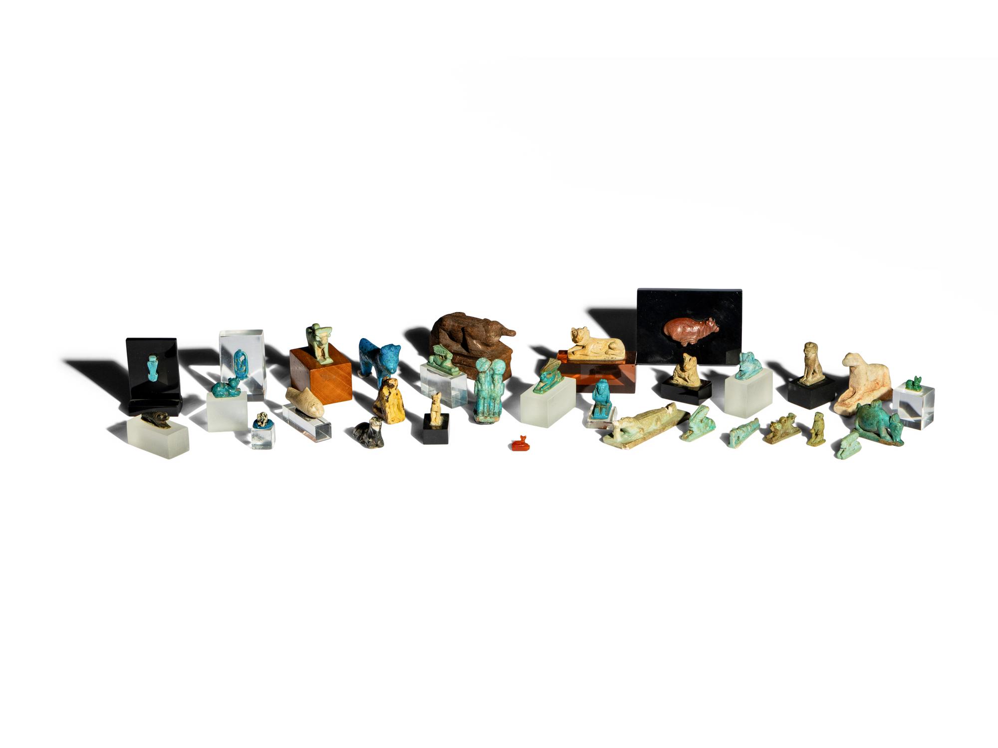 31 Egyptian Faience, Wood, and Stone Animals