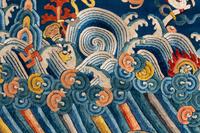 A Blue Ground Embroidered Silk Dragon Robe, Jifu