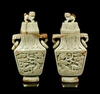A Pair of Chinese Carved Celadon Jadeite Covered Vases
