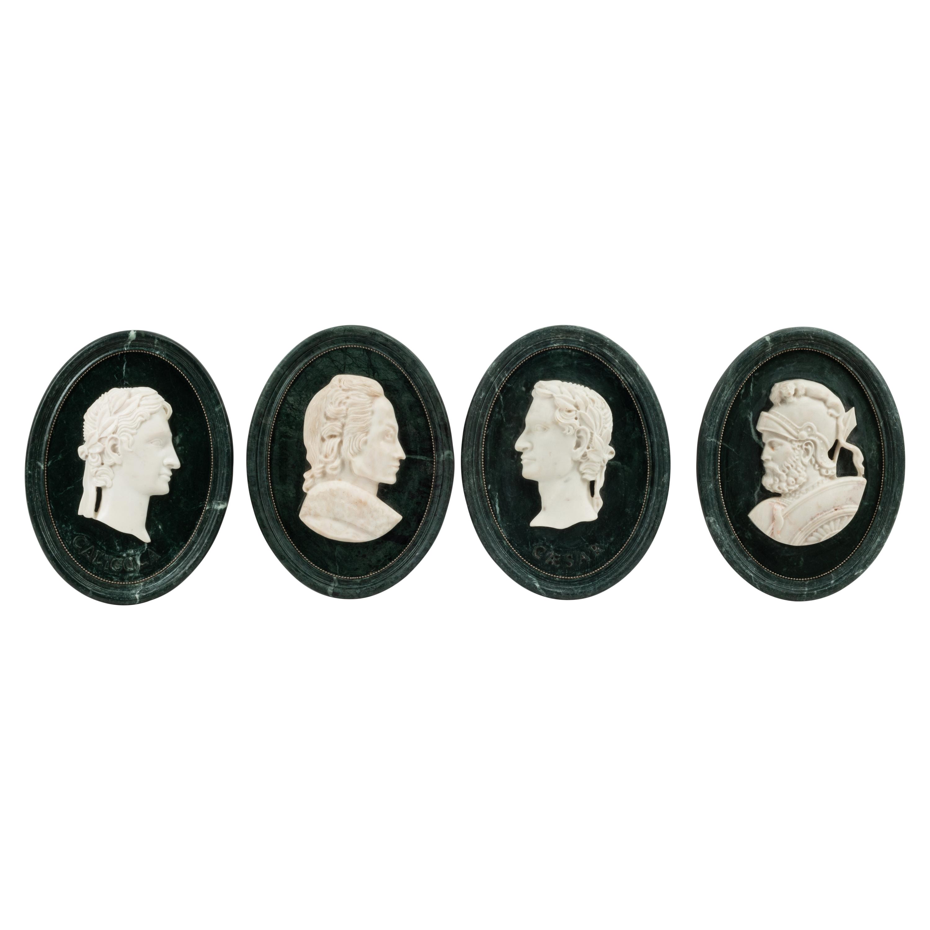 A Set of Four Italian Marble Oval Plaques