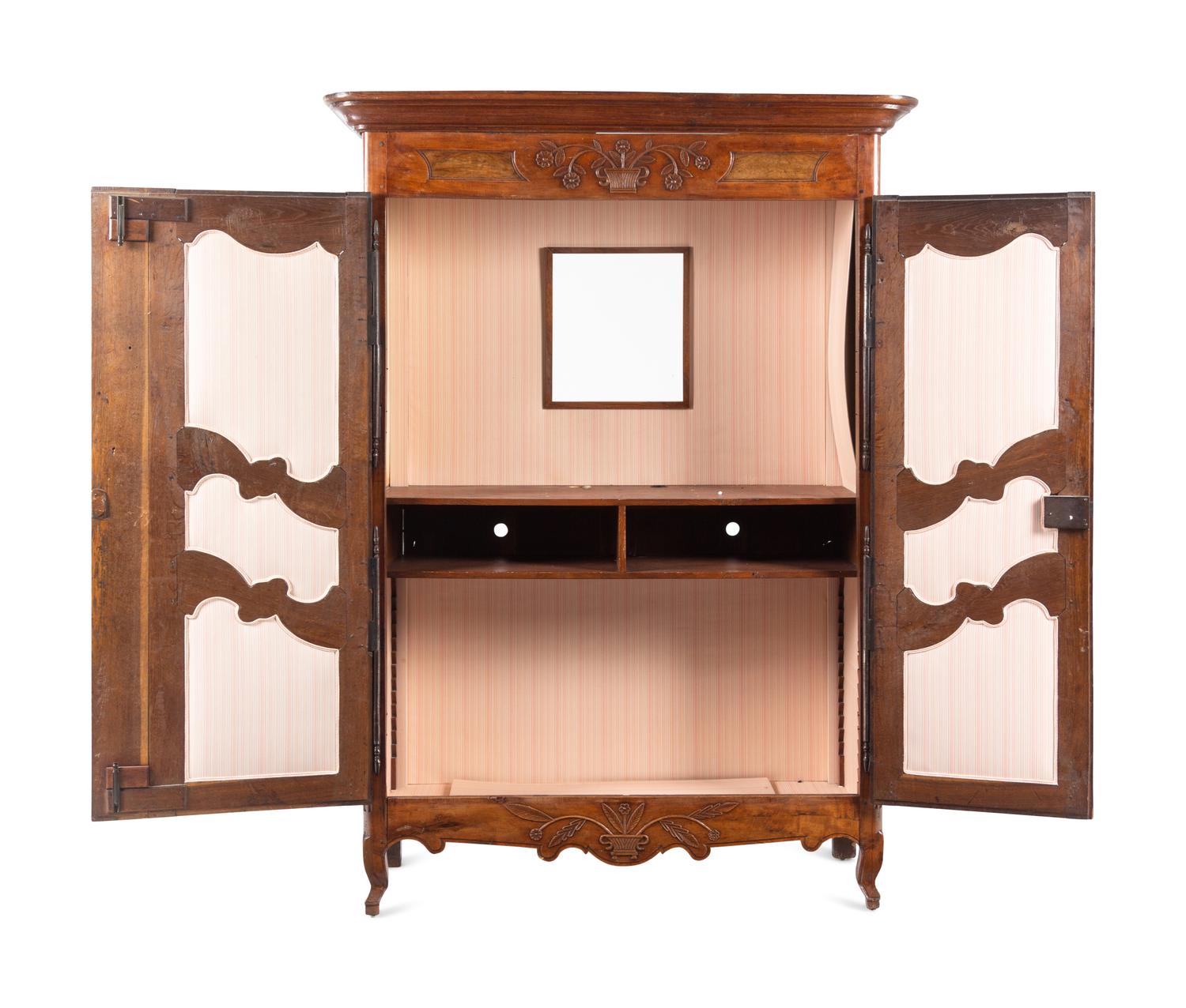 A French Provincial Walnut and Fruitwood Armoire