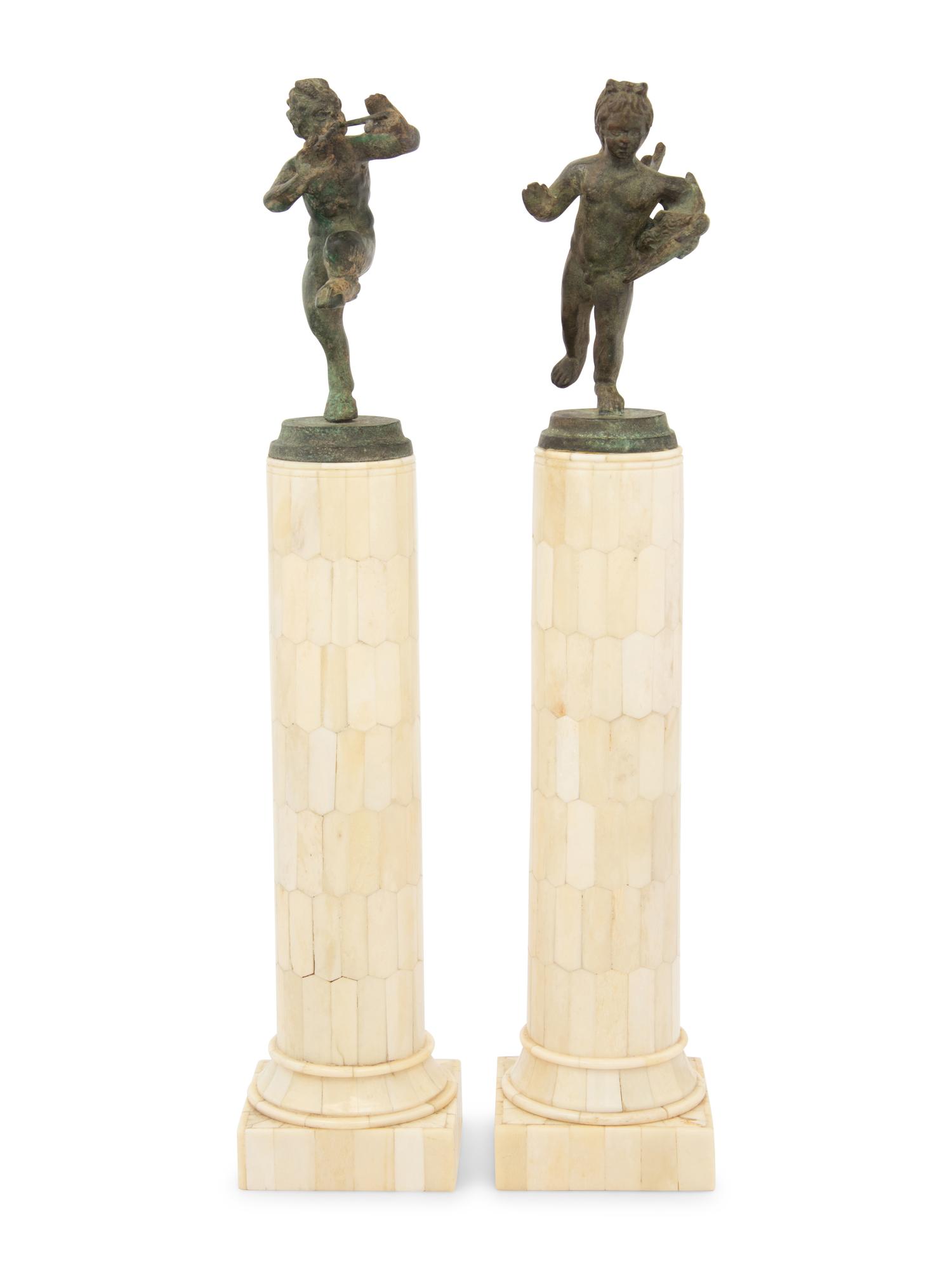 A Matched Pair of Bronze Figures on Resin Veneered Columns