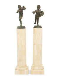 A Matched Pair of Bronze Figures on Resin Veneered Columns
