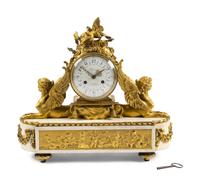 An Empire Gilt Bronze and Marble Mantel Clock