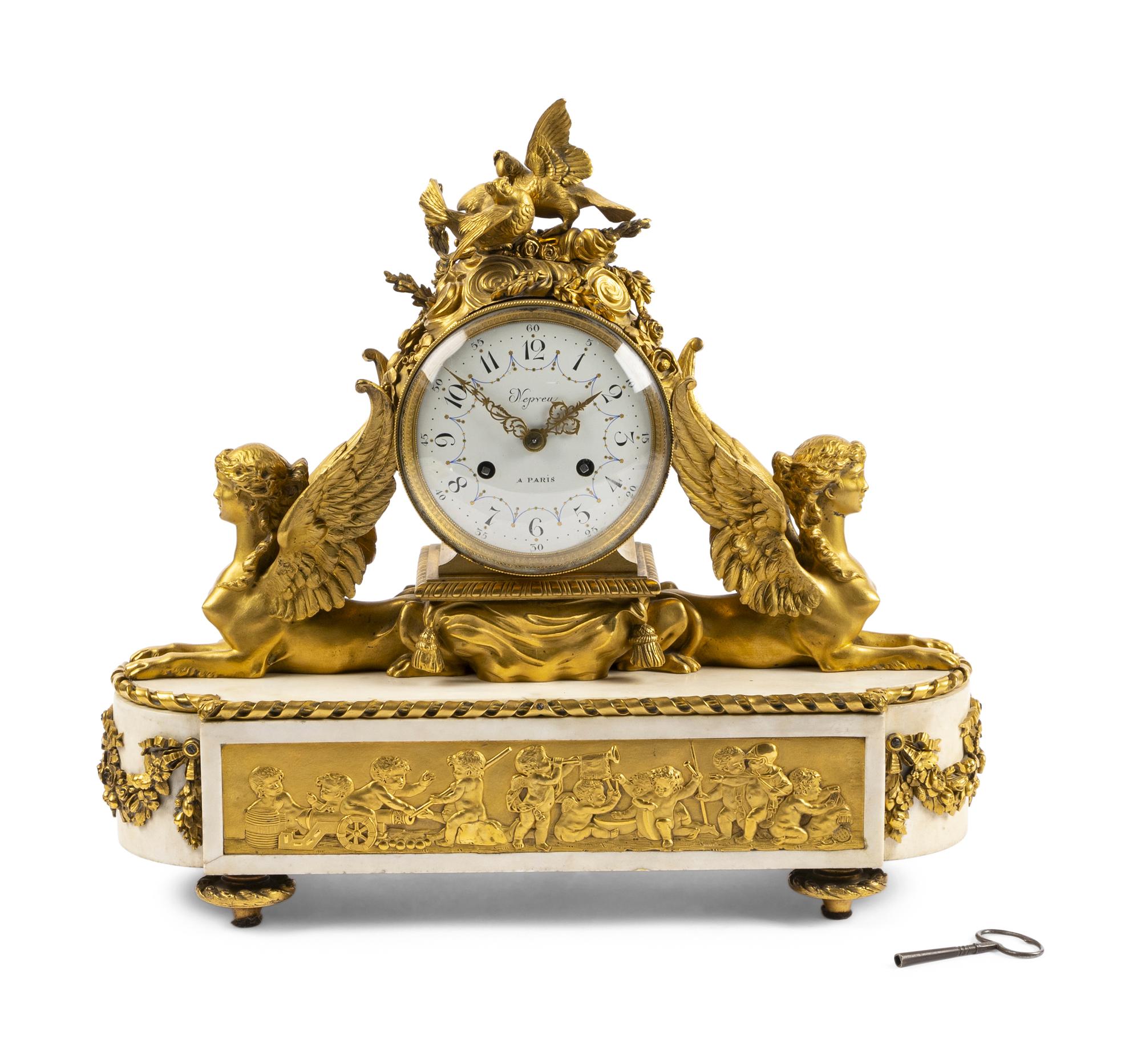 An Empire Gilt Bronze and Marble Mantel Clock