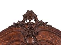 A Belgian Louis XV Style Carved Oak Trumeau Mirror