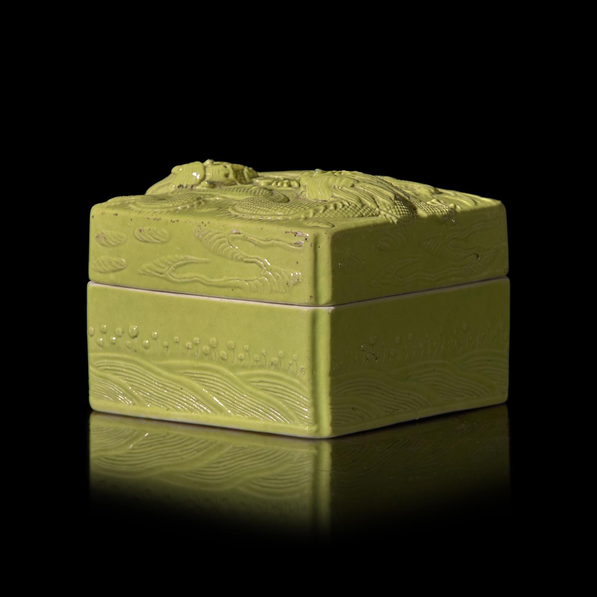 A Chinese Lime-Green Glazed Porcelain 'Dragons' Square Seal Paste Box and Cover, Late Qing Dynasty, Wang Bingrong Impressed Seal Mark 清晚期 王炳榮款檸檬綠釉模印雕二龍戲珠紋方型蓋盒