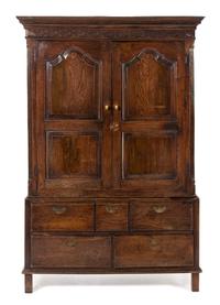 A George III Provincial Oak Linen Press Height 74 x width 50 x depth 21 inches. — 19TH CENTURY