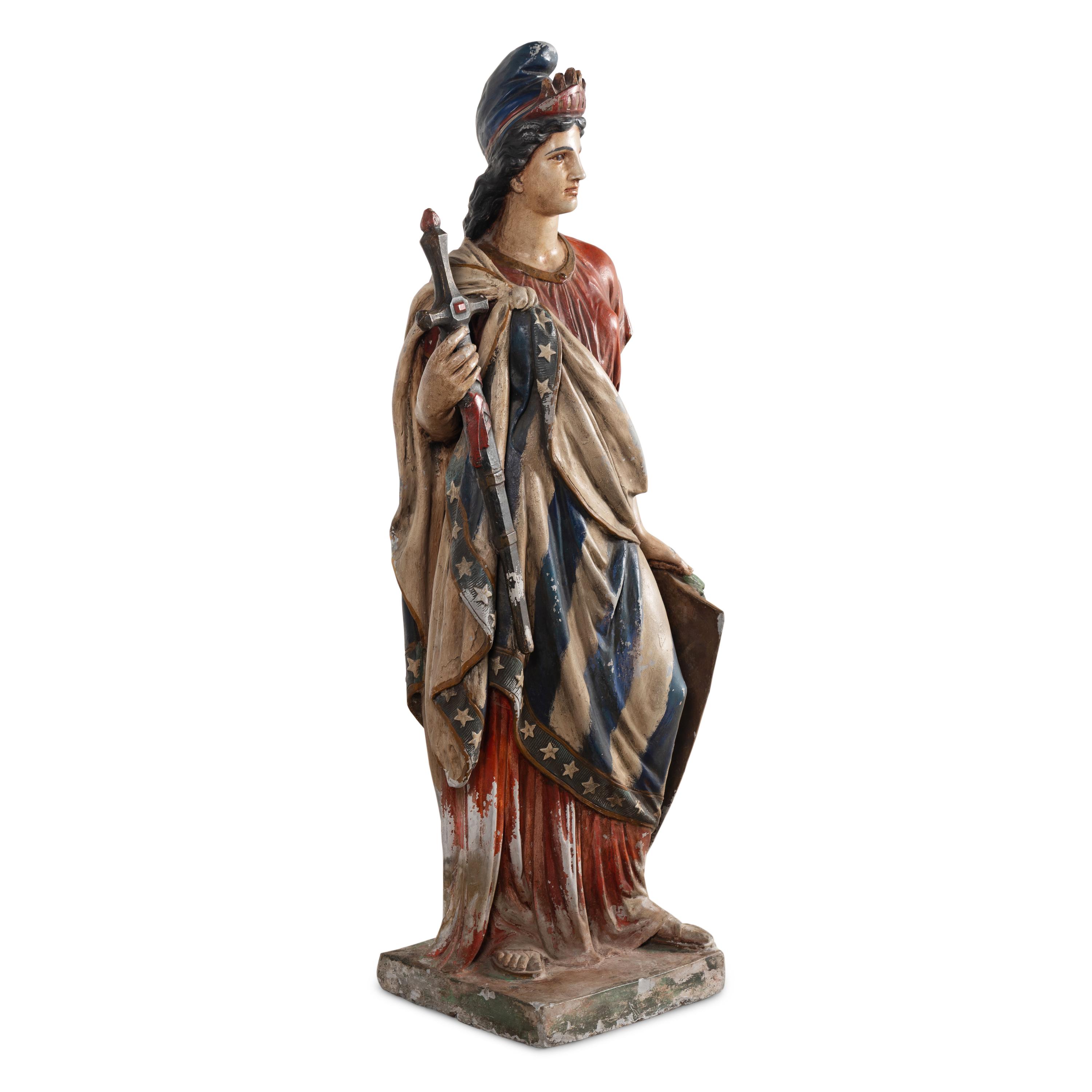 A Polychrome Painted Cast Zinc Goddess of Liberty Figure
