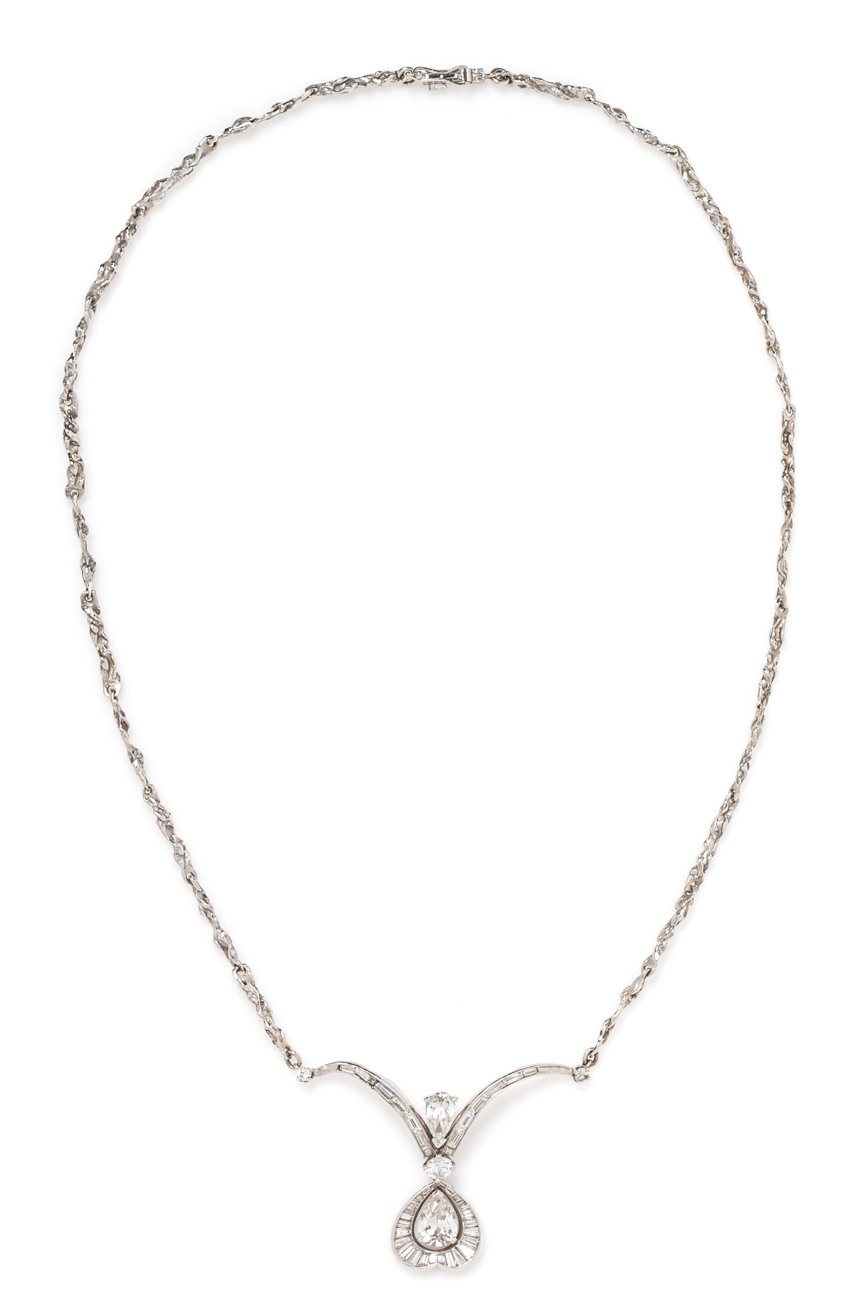 A Platinum and Diamond Pendant on White Gold Chain, 11.50 dwts.