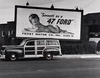 Philippe Halsman (1906-1997) Untitled ("Smooth as a 47 Ford" Billboard), c. 1947
