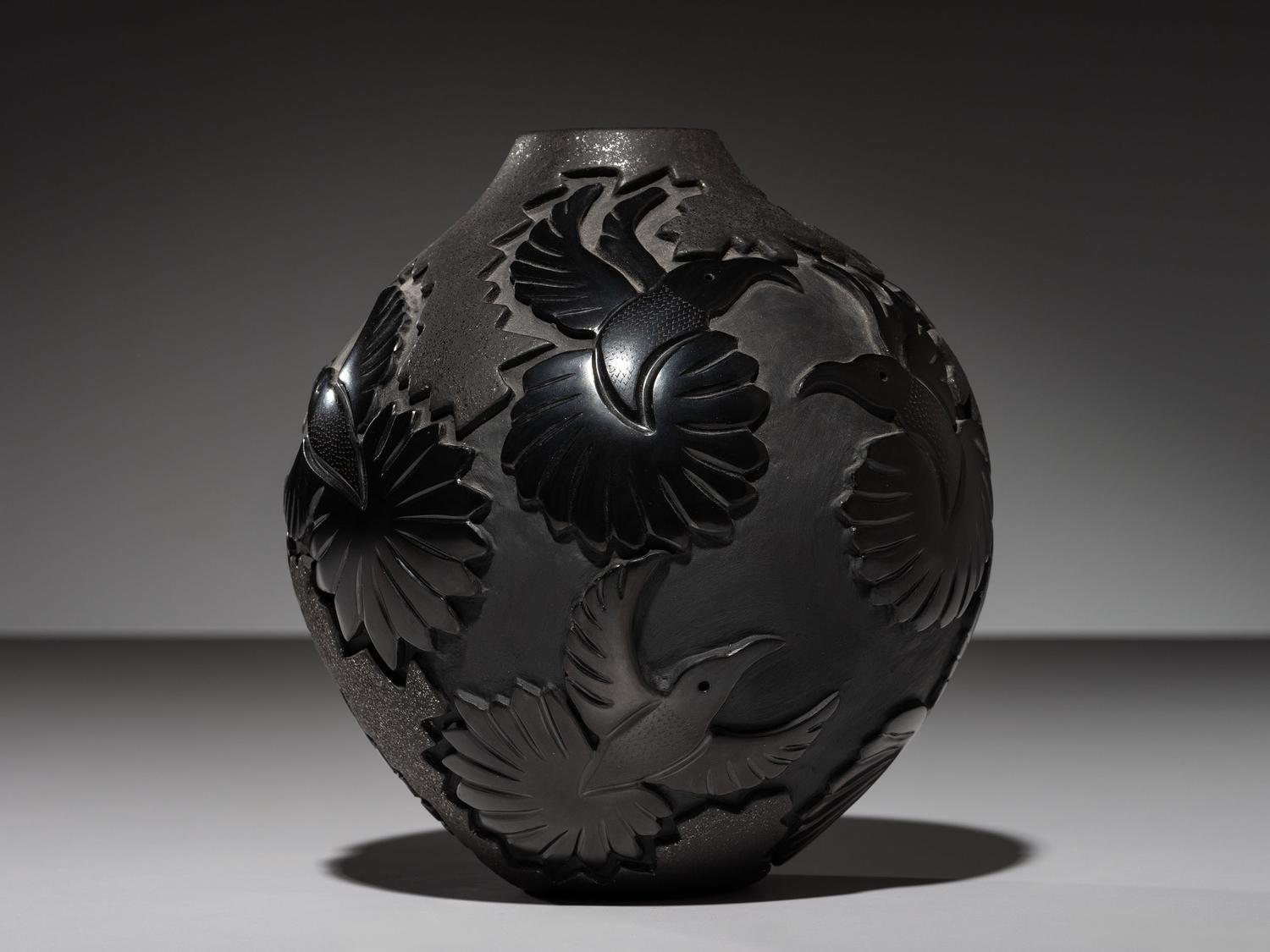 Carved Micaceous Blackware Jar, with Hummingbirds