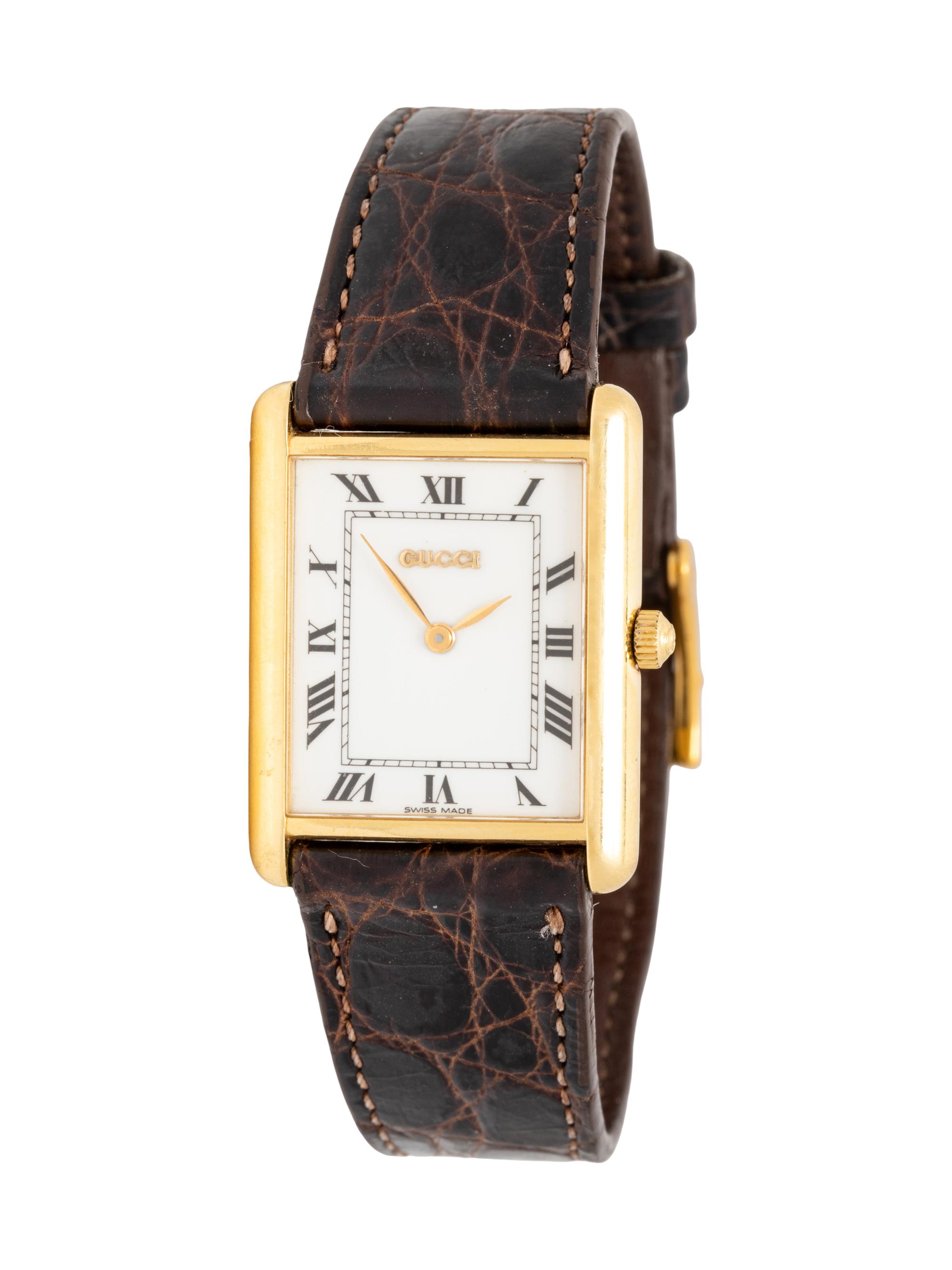 GUCCI, YELLOW GOLD WATCH
