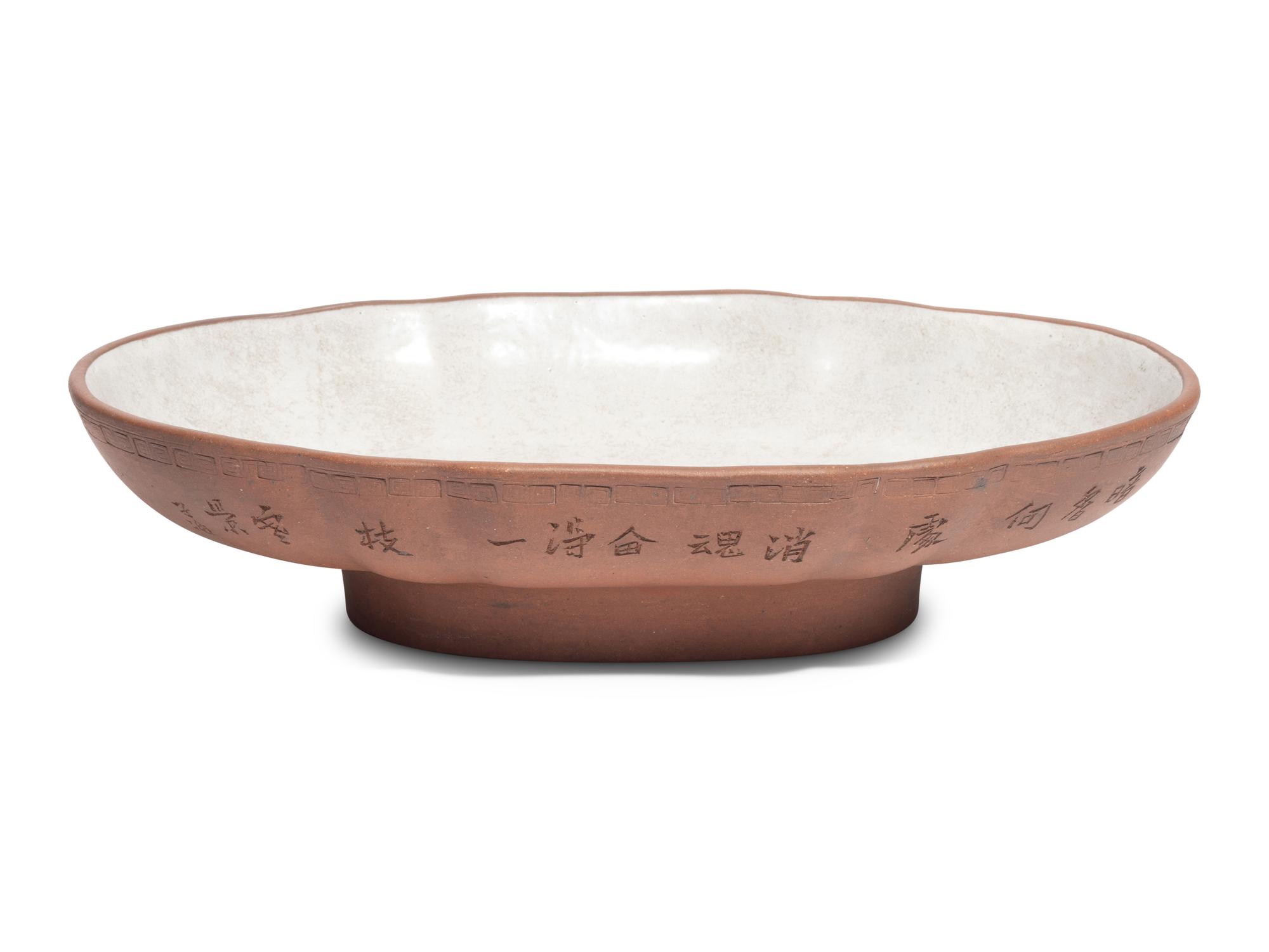Four Chinese Yixing Zisha Pottery Vessels