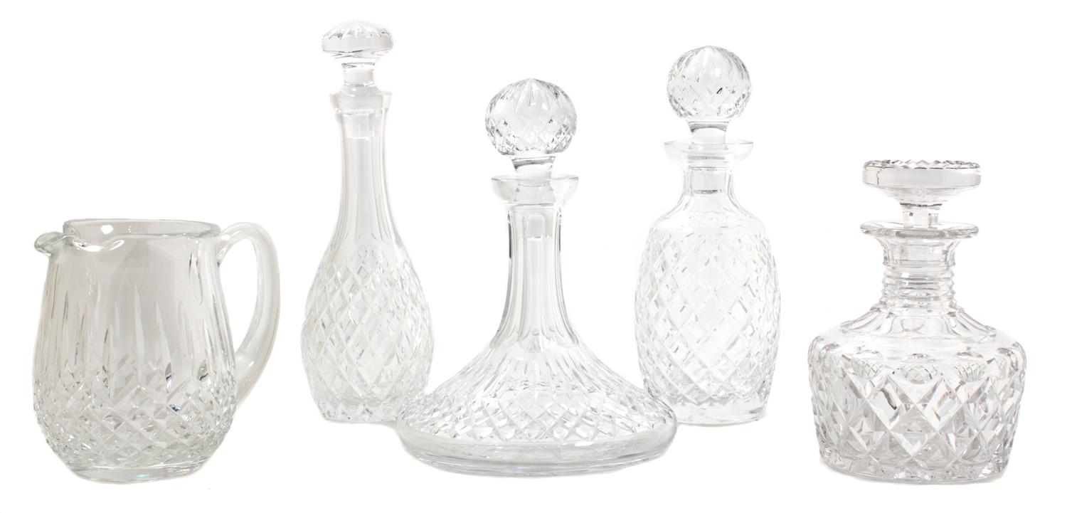 A Group of Four Cut Glass Decanters Height of tallest 11 1/2 inches.