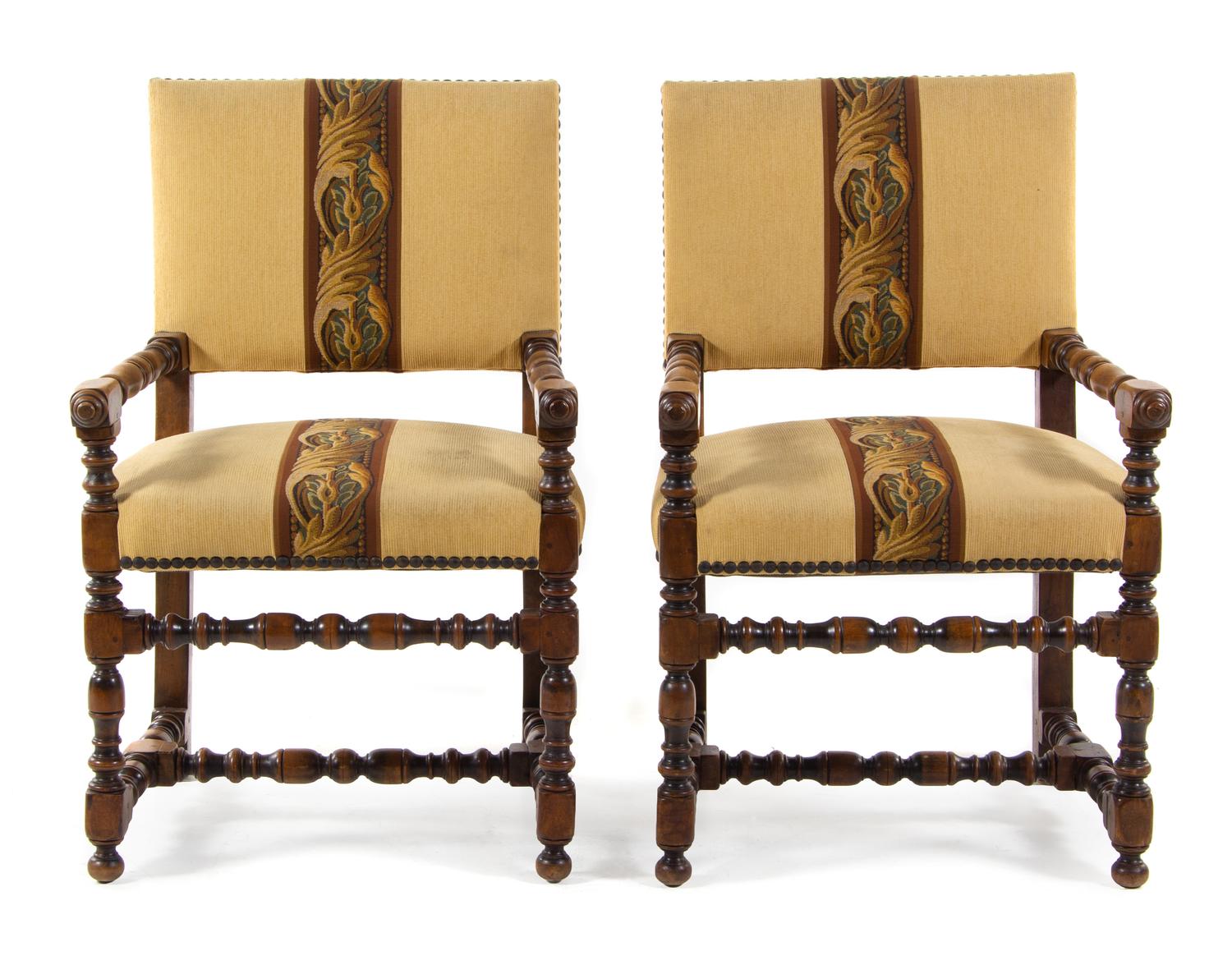 A Pair of Jacobean Rival Open Armchairs Height 39 inches overall. — 20TH CENTURY