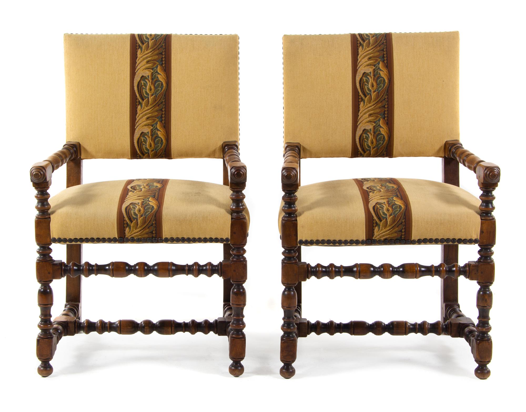 A Pair of Jacobean Rival Open Armchairs Height 39 inches overall. — 20TH CENTURY