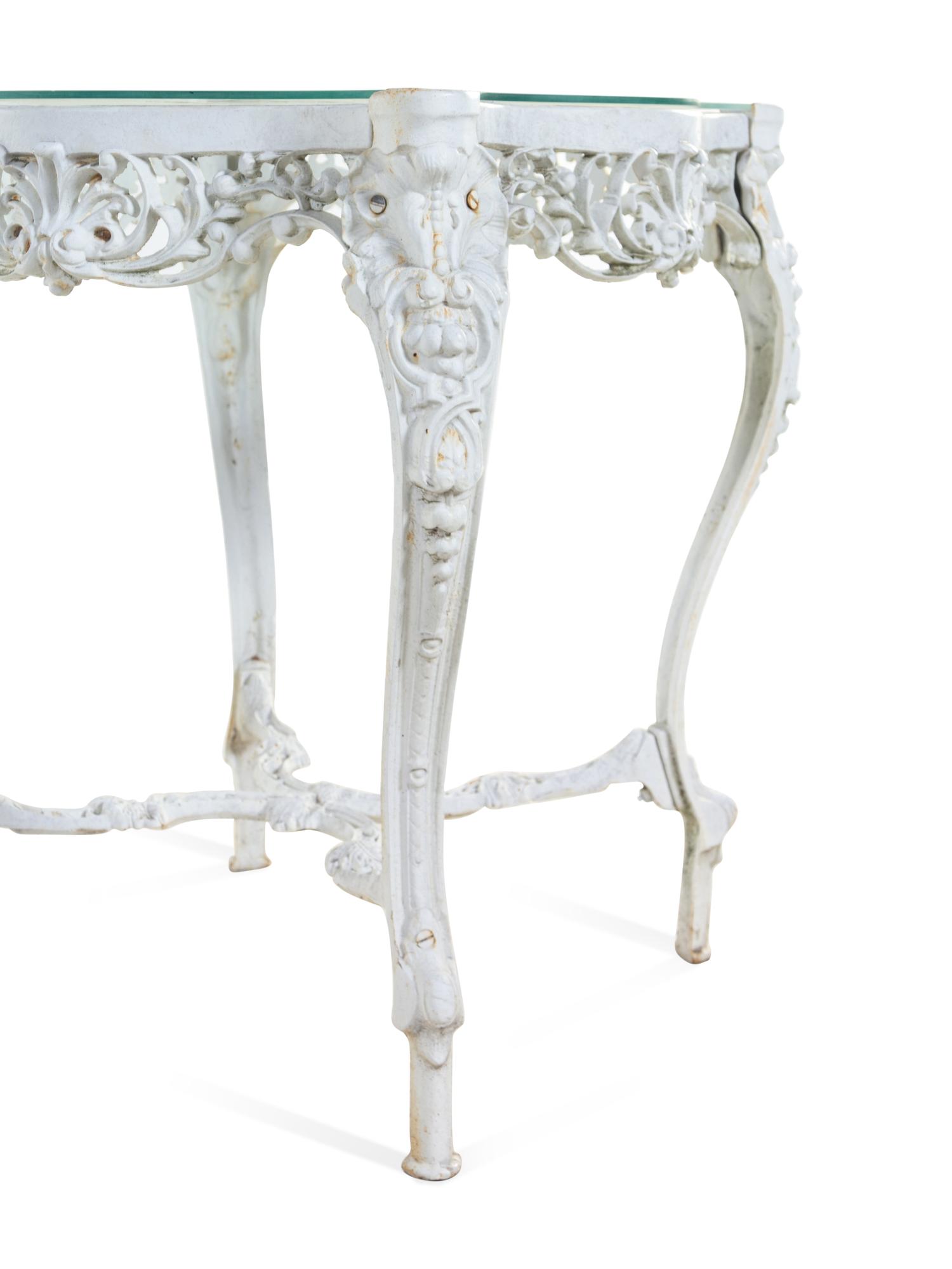 A Pair of White-Painted Cast Iron Tables