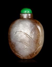 A Chinese Russet and Celadon Jade ‘Floral’ Snuff Bottle
