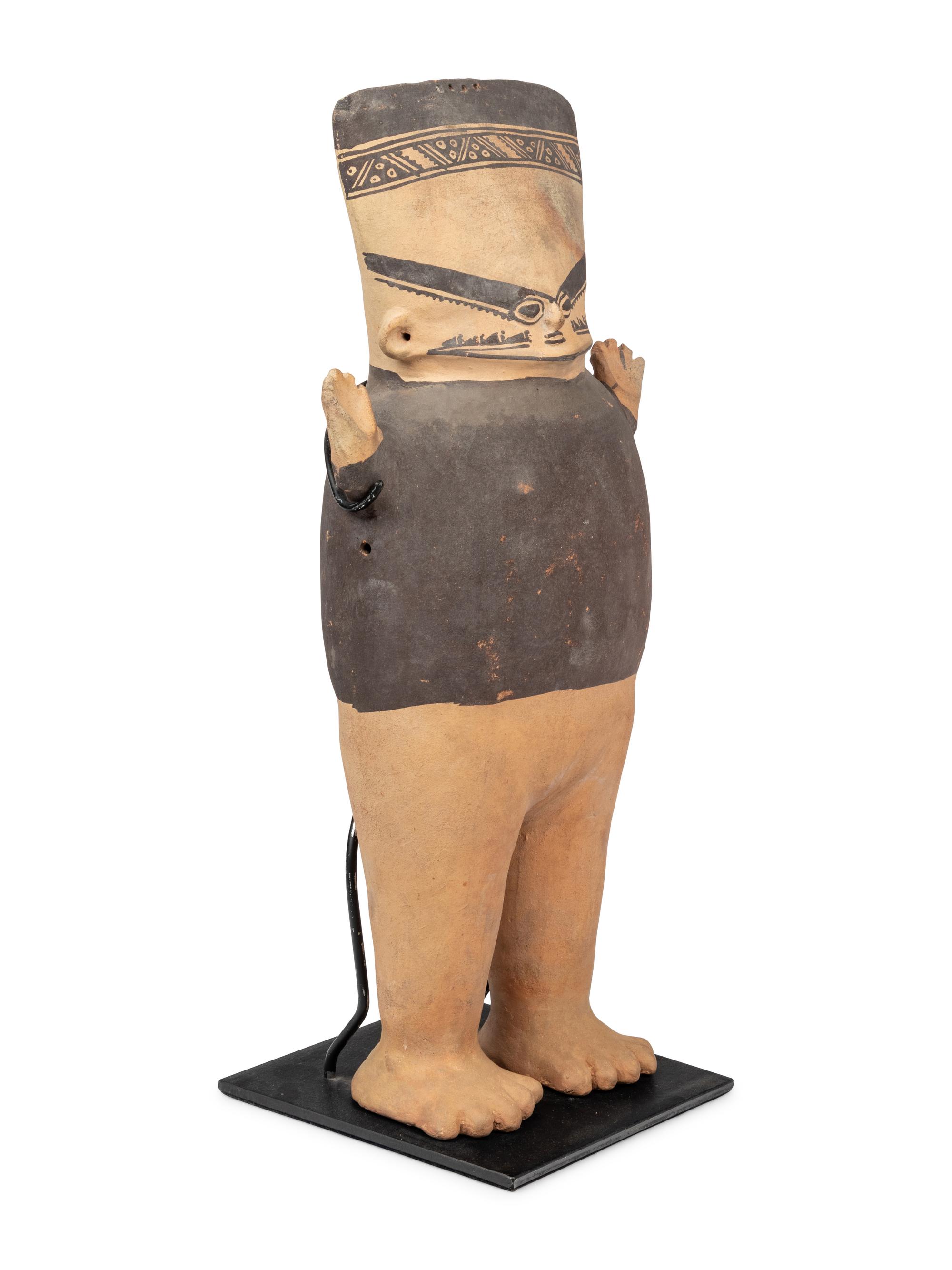A Chancay Bichrome Figure
