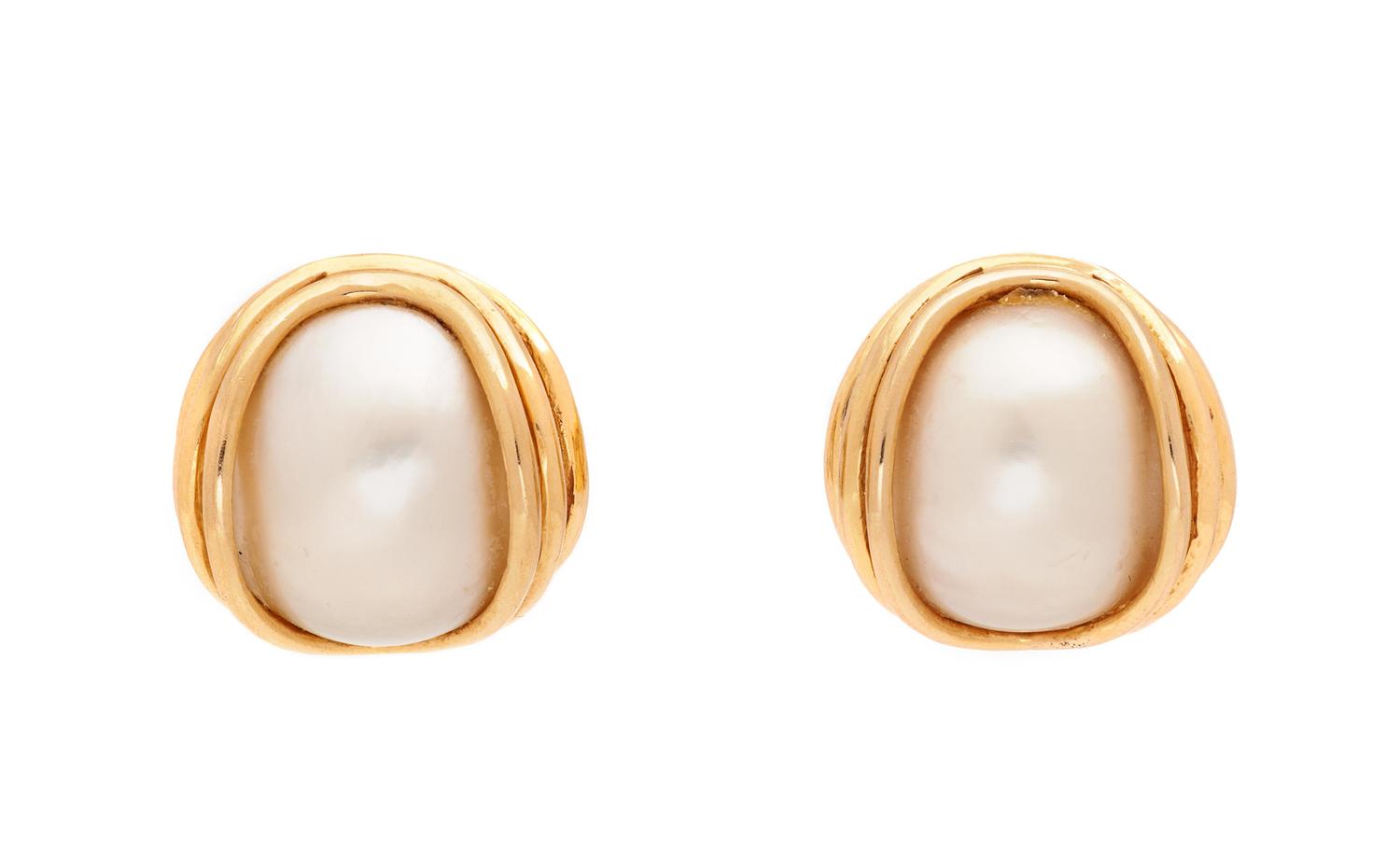 A Pair of 14 Karat Yellow Gold and Cultured Mabe Pearl Earclips,