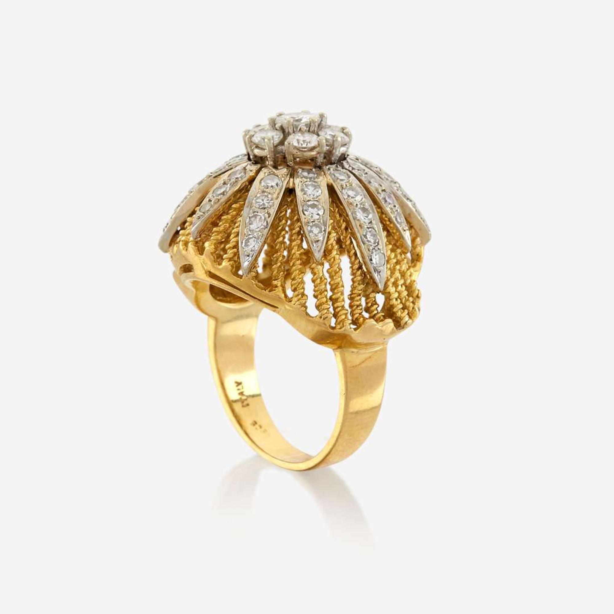 A bicolor gold and diamond ring