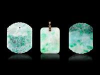 Three Chinese Apple Green and White Jadeite Pendants
