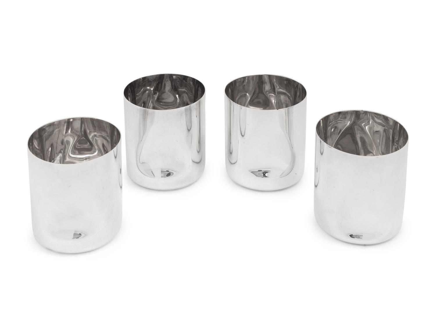 A Set of Four Elsa Peretti for Tiffany and Co. Italian Silver Thumbprint Tumblers