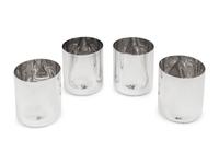 A Set of Four Elsa Peretti for Tiffany and Co. Italian Silver Thumbprint Tumblers