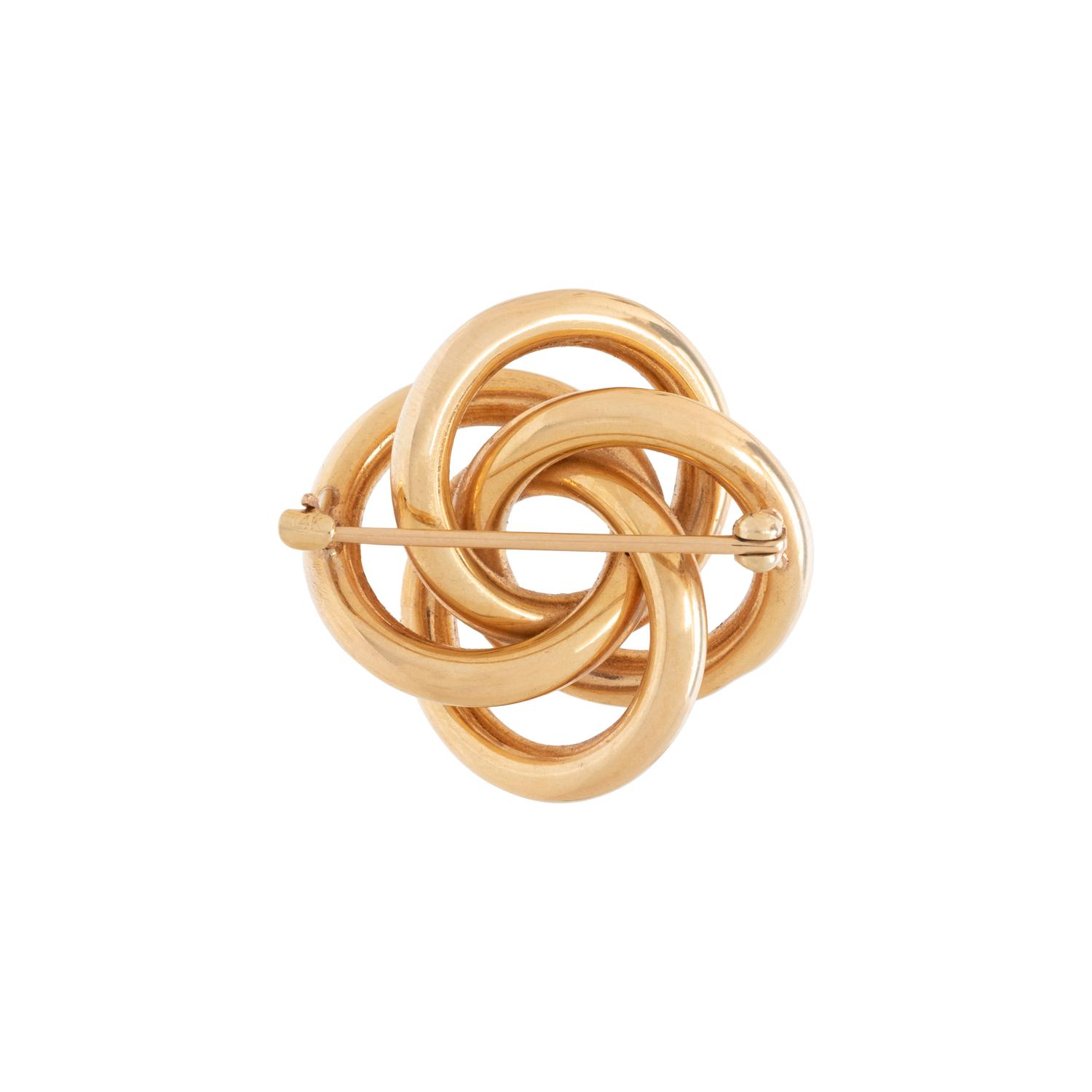 TIFFANY & CO., YELLOW GOLD LOVE KNOT BROOCH